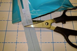 Use cheap or paper scissors to cut zipper Use cheap or paper scissors to cut zipper