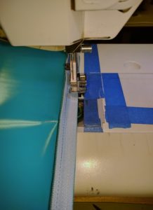 Blue Vinyl Zipper on Sewing Machine