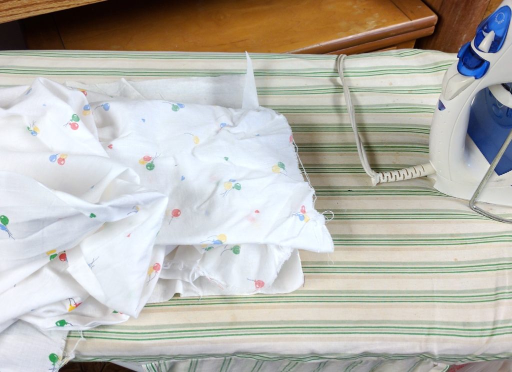 FLAT CAP TUTORIAL Fabric on the ironing board