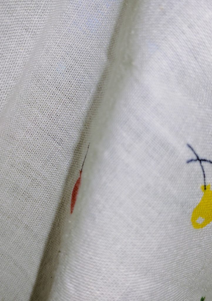 The fabric has a nice loose weave that helps with the translucency