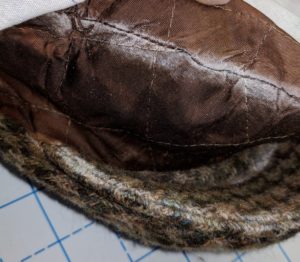 ay Lay the fabric over the Flat Cap