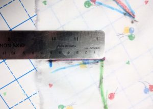 A ruler and the fabric