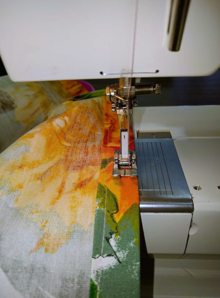 Stitch again one quarter of an inch from the top egde of the fold. Do this to both ends
