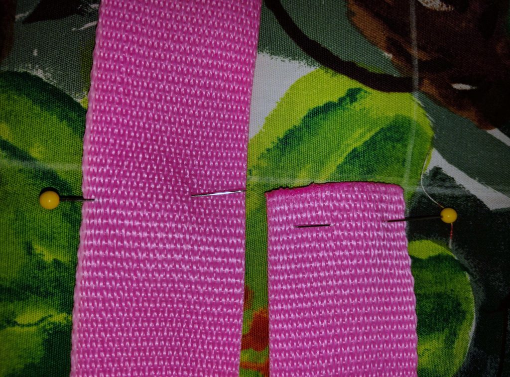 Mark the simple tote again half way between the center and the outside of the long side. Place your webbing inside of that mark and at the center edge of the short side